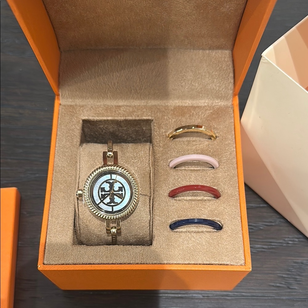 Tory Burch Gold Watch with Interchangeable Bands/ brand new never been worn